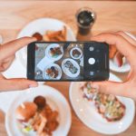 Smartphone Camera - person taking picture of the foods