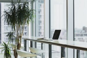 Smart Office - turned off laptop computer on top of brown wooden table